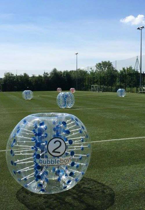 6 large bubble zorbs on a football field in London 